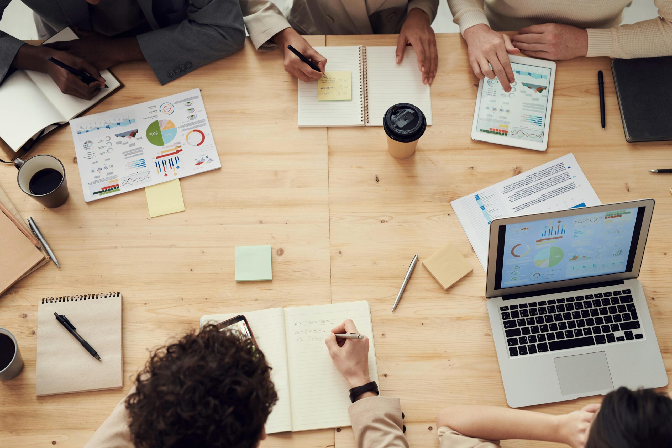 small business team around a laptop